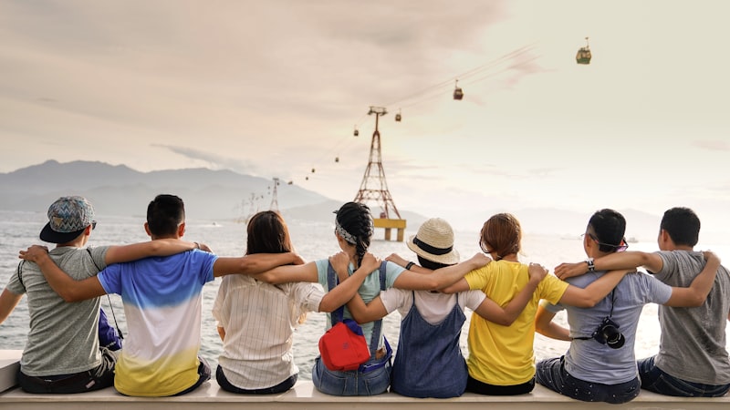 Friends laughing in peer group setting